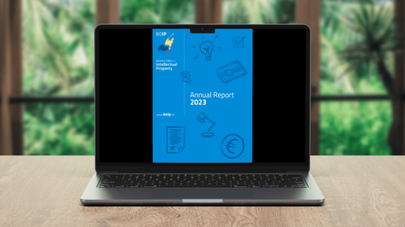 Laptop screen showing cover of BOIP Annual Report 2023